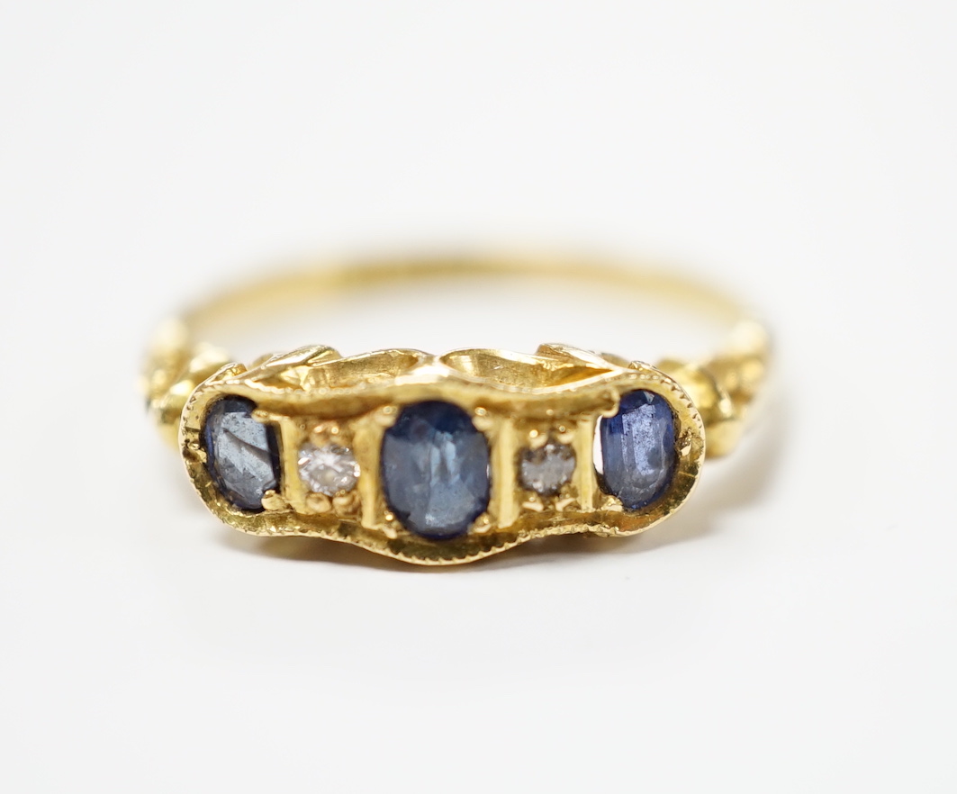 A late Victorian 18ct gold, sapphire and diamond ring, size N, gross weight 3.1 grams.